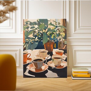 May include: A canvas art print depicts a still life scene with coffee cups, saucers, and a potted plant. The artwork features a palette of orange, brown, and green hues, with a focus on the interplay of light and shadow. The painting is displayed on a wooden floor.