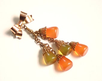 Vintage Vaseline Apple Juice Bakelite Dangle Bead Bow Brooch