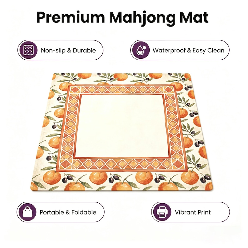 May include: A rectangular mahjong mat with a cream-colored center and an orange and olive branch border. The mat has the text "Premium Mahjong Mat" at the top and icons indicating it is non-slip, waterproof, portable, and has a vibrant print.