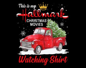 May include: A red vintage truck illustration with a Christmas tree in the bed and a dog in the driver's seat. The text reads "This is my Hallmark Christmas Movies Watching Shirt" with a gold crown above the word "Hallmark". Snowflakes are falling.