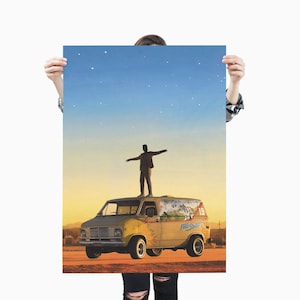 May include: A poster featuring a vintage van with a person standing on top, arms outstretched. The van has a desert landscape scene and the words "Free Spirit" on the side. The sky transitions from yellow to blue with stars.