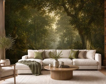 May include: A large-scale wall mural featuring a dense, dark green forest landscape with tall trees and soft, diffused light. The mural serves as a backdrop for a white sectional sofa, a round wooden coffee table, and a wooden armchair.