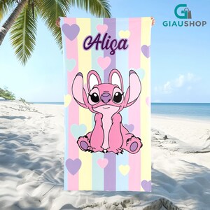 A colorful beach towel featuring a cartoon character from the movie Lilo & Stitch, with the character's name "Alisa" printed on it.