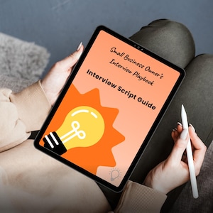 May include: A tablet displaying a cover for a "Small Business Owner's Interview Playbook" with the text "Interview Script Guide." The cover features a yellow lightbulb graphic against an orange burst.