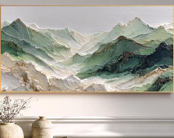May include: A rectangular wall art piece featuring a textured, impasto-style landscape painting of mountain ranges. The artwork displays shades of sage green, forest green, and white, with thick paint strokes creating depth and a gold-toned frame.