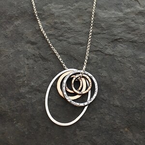 Mixed metal circle necklace  ~ ovals and circles ~ peacock feather ~ sterling silver ~ bronze ~ gold fill