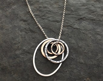 Mixed metal circle necklace  ~ ovals and circles ~ peacock feather ~ sterling silver ~ bronze ~ gold fill