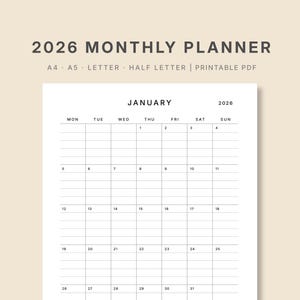 Op de afbeelding: Een witte maandplanner voor 2026 met de maand januari. De planner bevat een kalenderraster, het woord "GOALS" en de tekst "ONGI PLANNER CO ON ETSY". Beschikbaar in A4, A5 en half letter formaat.