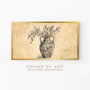 May include: A framed print featuring a black and white illustration of a Greek vase filled with olive branches and olives. The vase has a geometric pattern. The background is a textured beige with a gold border. Text at the bottom reads "FRAME TV ART".