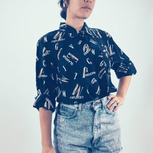 Vintage 90s Blouse Black Washed Silk Print Button Up Shirt Fashion Text Pattern