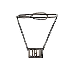 May include: Silver tie clip with a chain and a rectangular tag that says "JAM" in gold letters.