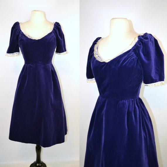 purple tea length dress