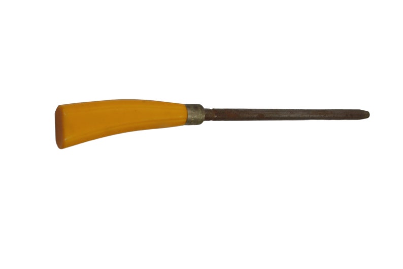 May include: A yellow plastic handled metal sharpening steel. The steel is rusty and has a pointed tip.