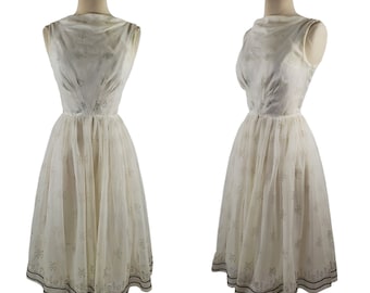 1960s White Sleeveless Cocktail Dress with Dandelion Puff Print