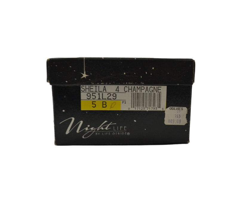 May include: Black shoebox with a star pattern and the text "Night Life by Life Stride" on the front. The box has a yellow label with the text "SHEILA 4 CHAMPAGNE 951L29 5 B F1 0 17125 71793 5 OGILVIE'S 17 753 #49.00".