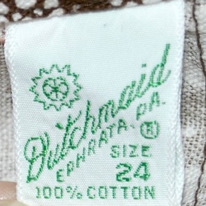 May include: White tag with green text that reads "Buttermilk" "EPHRATA, PA." "SIZE 24" and "100% COTTON".