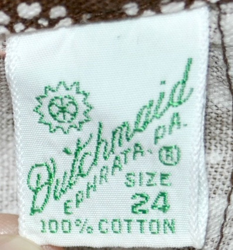 May include: White tag with green text that reads "Buttermilk" "EPHRATA, PA." "SIZE 24" and "100% COTTON".