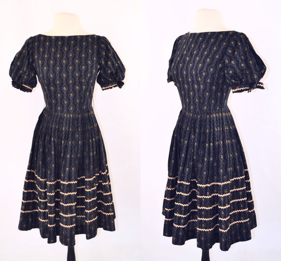 1950s/1960s Black Fit and Flare Dress with Purple