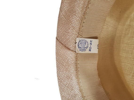 MM STRAW HAT IN BEIGE RAFFIA WITH BLACK FLOWER ACCENT