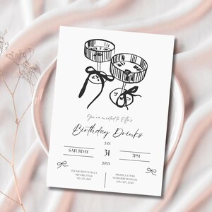 May include: A black and white invitation card with a hand-drawn illustration of two champagne glasses. The text reads "You're invited to Ella's Birthday Drinks" with date and time details. A bow graphic is at the top and bottom.