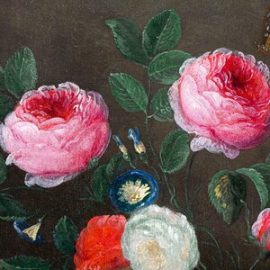 May include: A still life painting featuring a bouquet of pink, white, and red roses with green leaves and blue flowers. The flowers are arranged in a vase on a dark brown background.