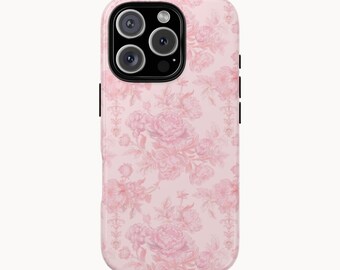 May include: A light pink phone case with a floral pattern of pink roses. The case has a camera cutout with three lenses and a flash. The case has black buttons on the side.