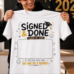 May include: White t-shirt with the text "SIGNED & DONE" in black and gold, with "CLASS OF 2026" below. The shirt has a graduation cap graphic and a space for signatures. The bottom reads "IF YOU CAN READ THIS... YOU OWE ME A MEMORY."