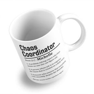 May include: White ceramic mug printed with "Chaos Coordinator" in black. The mug features a definition of the term, including the name "Michelle". A humorous gift for someone who manages a busy schedule.