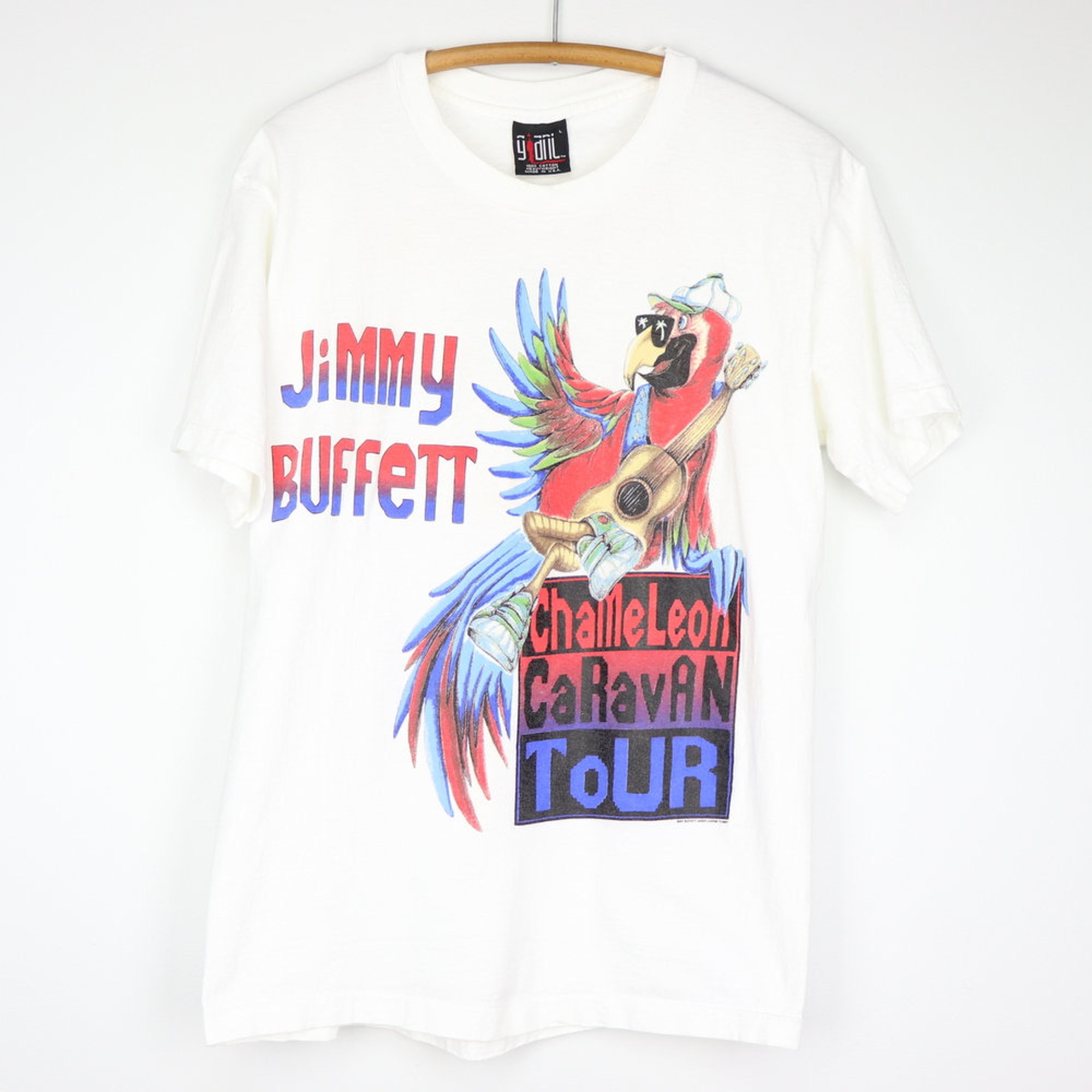 Discover vintage 1994 Jimmy Buffett Chameleon Caravan Tour Shirt