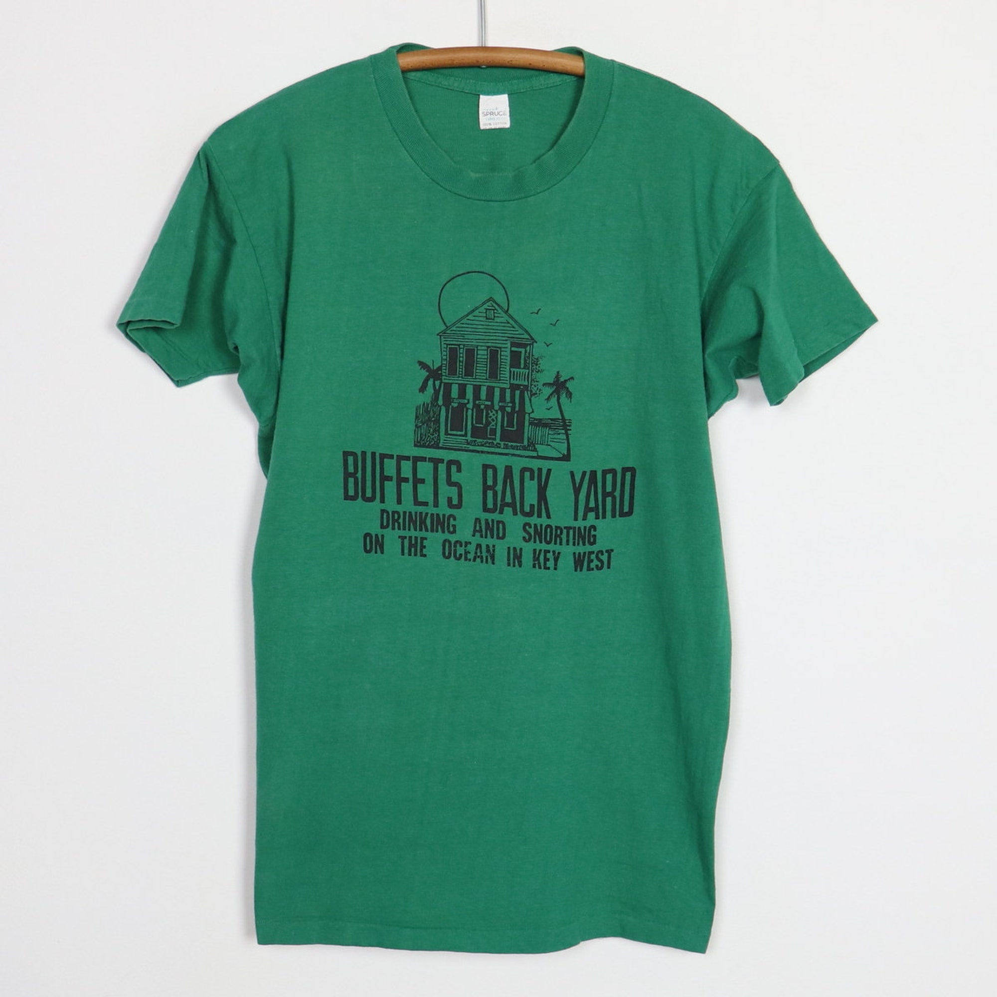 Discover vintage 1970s Jimmy Buffett's Back Yard Drinking And Snorting Key West Shirt