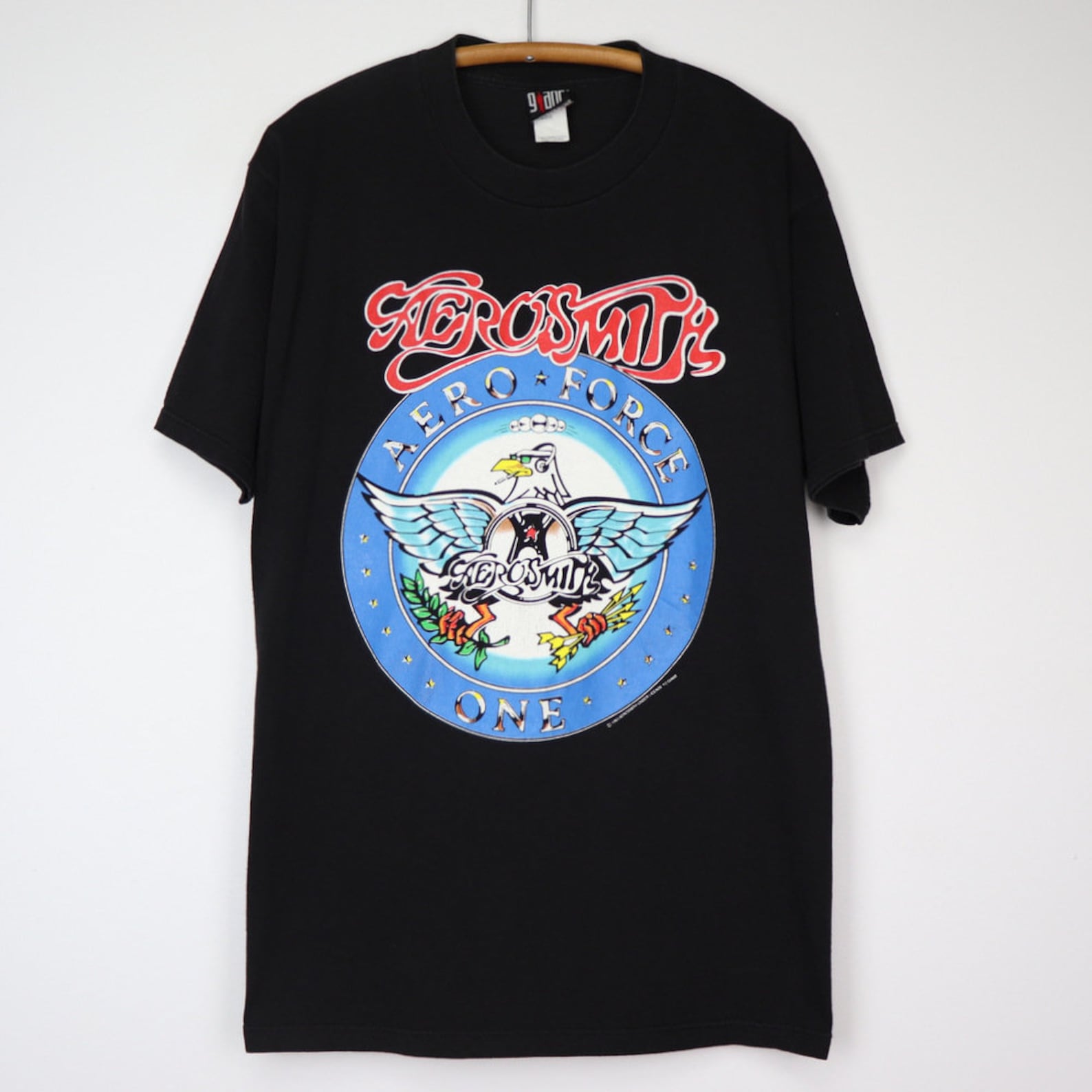 black design on black shirt