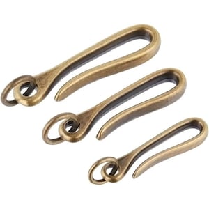 May include: A rustic wooden sign with the text "Welcome to our home" in a handwritten style. The sign features a distressed finish and a simple, inviting design, perfect for a front porch or entryway.