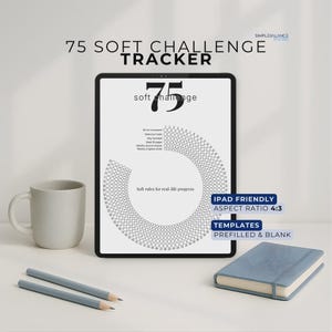 May include: A digital 75 Soft Challenge Tracker displayed on a tablet. The tracker includes a circular design with prompts for daily habits. A mug, pencils, and a notebook are also present. Text on the tablet reads "75 Soft Challenge Tracker."