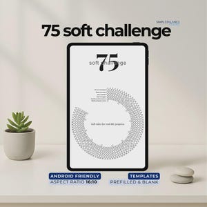 May include: A digital tablet displays the text "75 soft challenge" in black. The screen shows a circular graphic with text, and the words "Android Friendly" and "Templates" are at the bottom. A small potted plant and two smooth stones are on the white surface.