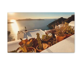 Toile coucher de soleil de Santorin avec plantes succulentes en pot