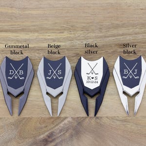 This image show the color options for the divot tools. Gunmetal/black, beige/black, black/silver and silver/black.