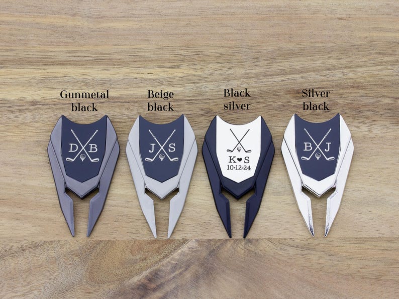 This image show the color options for the divot tools. Gunmetal/black, beige/black, black/silver and silver/black.