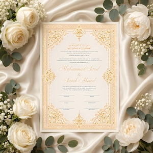 May include: A rectangular Islamic marriage contract document with gold ornate borders and black text, featuring the names Muhammad Saad and Sarah Ahmed, surrounded by white roses and eucalyptus leaves on a draped cream satin fabric background.