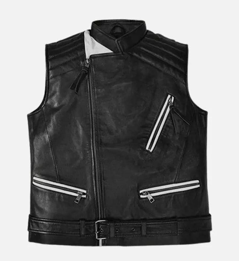 May include: Black leather vest with a stand-up collar, a diagonal zipper, and two zippered pockets with white stripes. The vest has a belt with a buckle at the waist and quilted shoulder details.