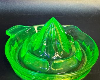 Exprimidor/raspador de cítricos de vidrio de uranio con pestaña