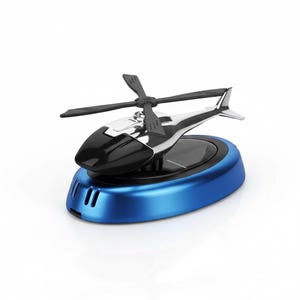 May include: A solar-powered helicopter car air freshener. The miniature helicopter has a black and silver body with a rotating propeller. It sits on a blue oval base with a solar panel. The design is sleek and modern.