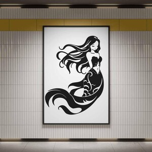 May include: Black and white illustration of a mermaid with flowing hair and a decorative tail. The mermaid is depicted in a graceful pose, wearing a strapless dress. The artwork is framed and displayed on a wall with a tiled pattern.