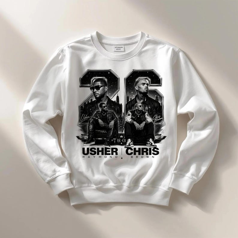 A black and white digital art piece featuring portraits of singers Usher and Chris Brown sitting in front of a stylized city skyline with the text "USHER x CHRIS" and decorative "22" branding elements.