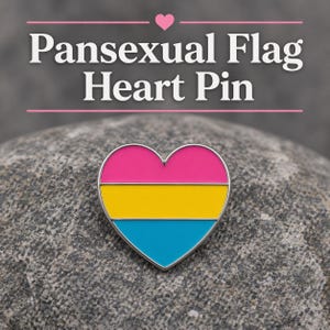 May include: A heart-shaped pin with the Pansexual Pride flag design. The pin features a pink top, yellow center, and blue bottom, all outlined in silver. The text "Pansexual Flag Heart Pin" is displayed above the pin.