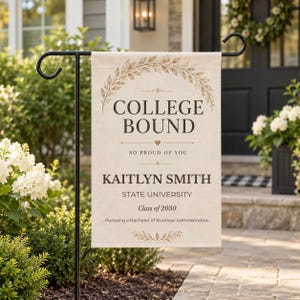 May include: A rectangular garden flag featuring a beige background with a brown leaf wreath design at the top. The text reads COLLEGE BOUND, SO PROUD OF YOU, KAITLYN SMITH, STATE UNIVERSITY, Class of 2030, and Pursuing a Bachelor of Business Administration.