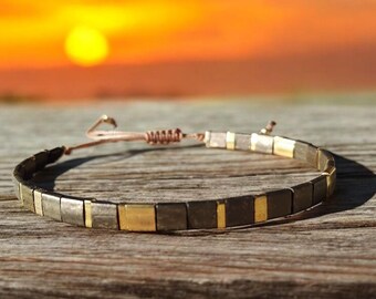 Women's bracelet made of Miyuki Tila beads, bronze & gold sliding.