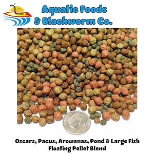 May include: A close-up of fish food pellets in shades of brown, green, and orange. The image includes a dime for size comparison. Text at the top reads "Aquatic Foods & Blackworm Co." and at the bottom, "Oscars, Pacus, Arowanas, Pond & Large Fish Floating Pellet Blend."