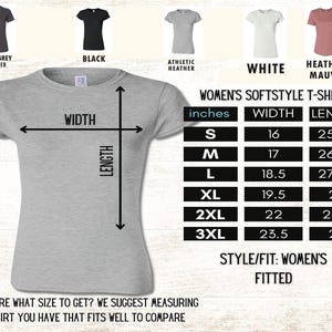 May include: A light grey Women's Softstyle T-shirt with size and measurement details in inches. The shirt is shown with width and length measurements. Available colors are dark grey, black, athletic heather, white, and heather mauve.