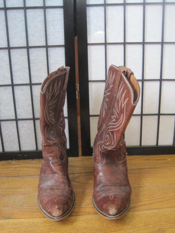 cowboy boots with white stitching