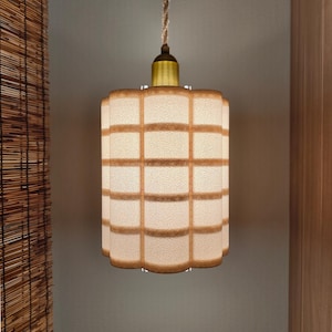 May include: A white ceramic mug with a black handle and the text "But First, Coffee" in a black, handwritten-style font. The mug is likely 11-15 ounces in size, perfect for a morning beverage.